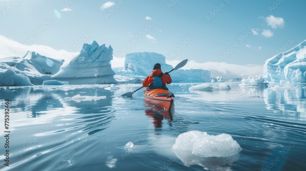 Naklejka premium Adventurous person kayaking among breathtaking icebergs in a serene icy landscape