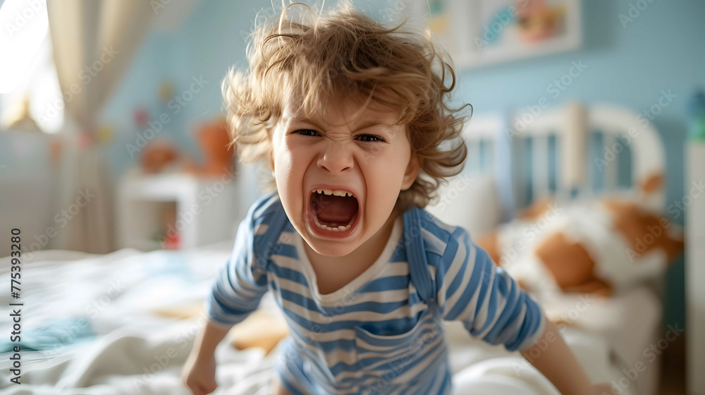 toddler throwing a tantrum because he doesn't want to have his diaper