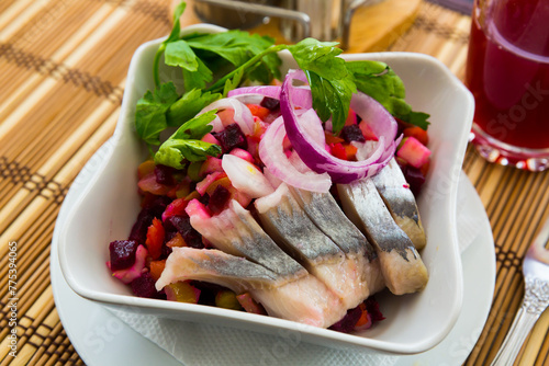 Vinaigrette salad with salted herring. Russian dish