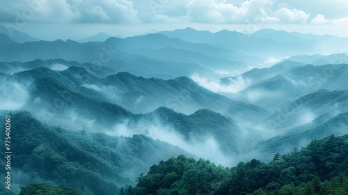  A bird's-eye view of mountains shrouded in fog and mist
