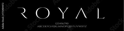 Royal font luxury elegant rich modern sophisticated font showcasing vintage alphabet letters and numbers. Premium uppercase fashion design typography. Vector illustration exuding luxury.