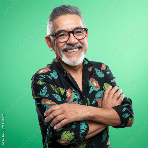 lifestyle photo Happy, arms crossed and portrait of man on green screen for confident, fashion and elegant Hispanic American.