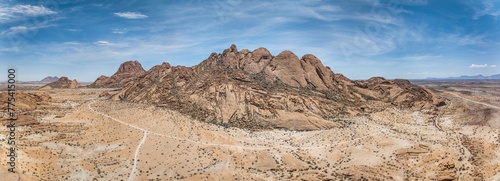 Drone panorama of the Spitzkoppe in Namibia during the day against a blue sky