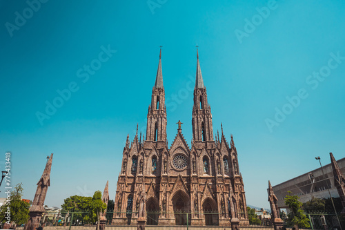 Exteriors during the afternoon of the Cathedral "Diocesan Sanctuary of Our Lady of Guadalupe" of Zamora Michoacan, shows Gothic style architecture.