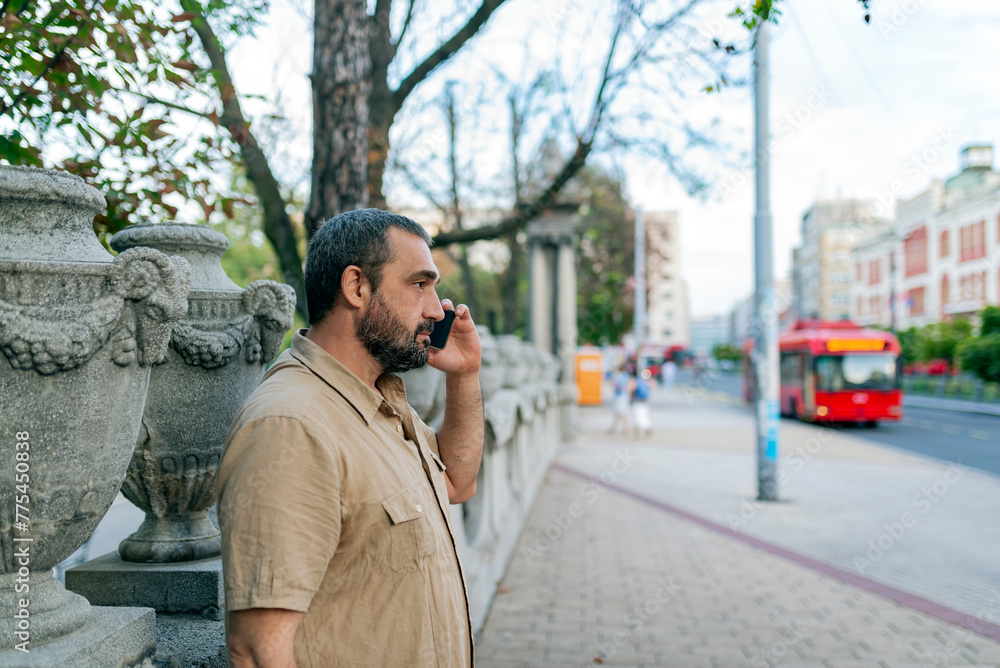 Man with Phone in the City Street Man with Phone in the City Street