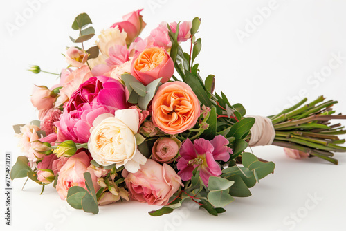 A vibrant bouquet of mixed flowers including roses and lilies, beautifully arranged and isolated on a white background.