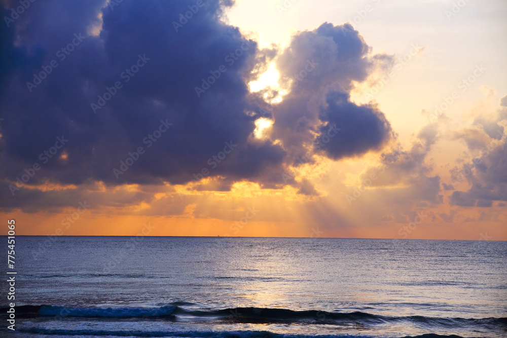 Beautiful clouds abstract during sunrise at the beach