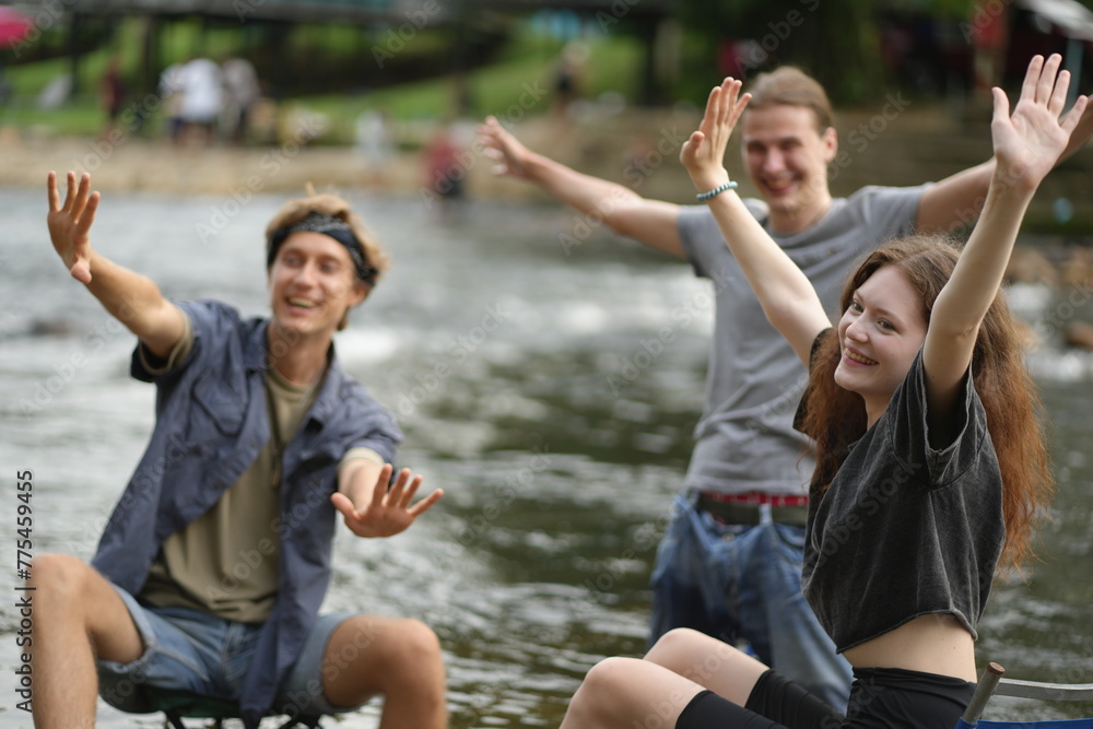 Group of Young man and woman enjoy and fun outdoor lifestyle travel nature forest mountain on summer holiday vacation. FRIENDS IN NATURE ENGAGED IN OUTDOOR ACTIVITIES.
