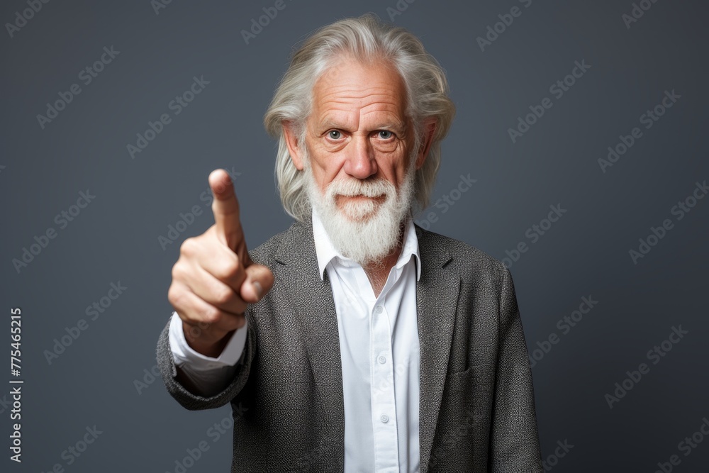 Senior man 65 plus posing in studio, portrait photography on dark background. Senior man 65 plus posing in studio, portrait photography on dark background.