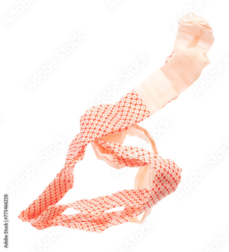 String rope obi Japanese Traditional Komono equipment fly in air with curve. String rope obi Japanese Traditional Komono fabric is beautiful clothes for ceremony event. White background isolated