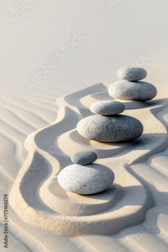 Minimalist  abstract background  Several rocks are positioned on top of a sandy beach  serene calm peaceful Zen atmosphere