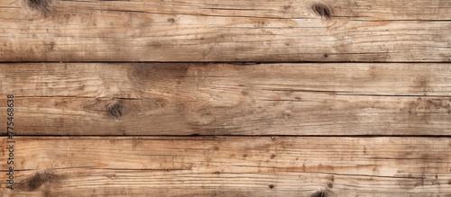 Detailed view of a textured wooden wall featuring a prominent knot in the wood grain