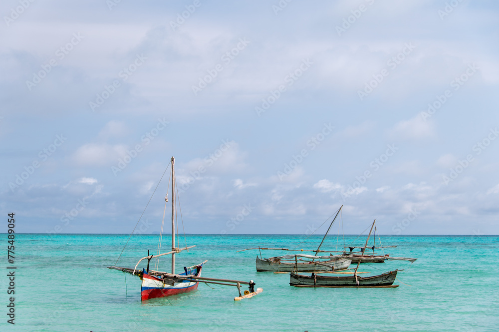 Local fishing boats on the beach at Nosy Iranja in Madagascar