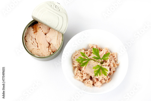 canned tuna in ceramic bowl isolated on white background top view