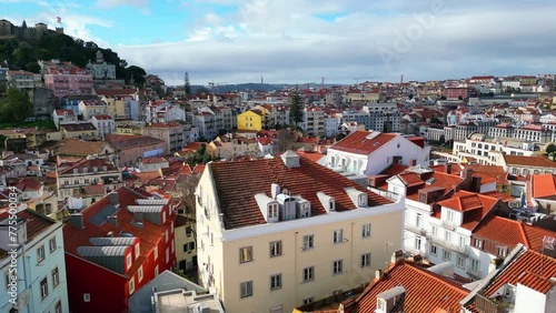 Rising over mouraria, historic area of ​​lisbon city and fly over the lisbon,Portugal. photo