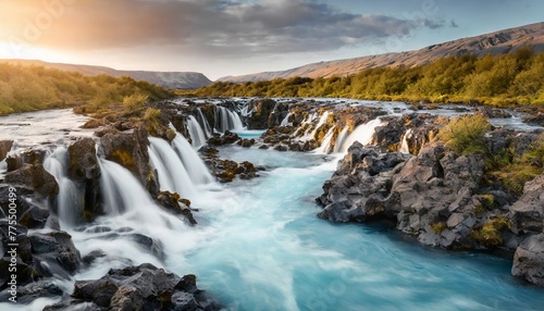 wonderful summer view of bruarfoss waterfall secluded spot with cascading blue waters great sunset in iceland europe beauty of nature concept background
