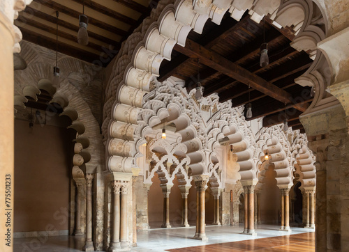Picturesque Moorish architecture of inner halls in fortified medieval Islamic palace of Aljaferia in Zaragoza, Spain.. photo