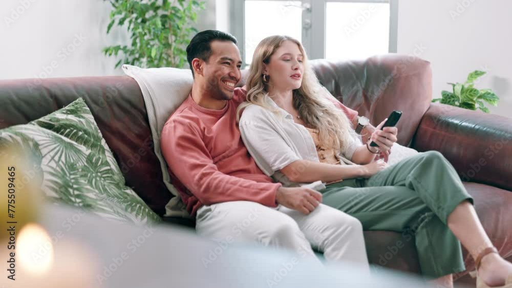 Love, movie or television with couple on sofa in home living room together for subscription entertainment. Smile, watching tv or streaming video with happy young man and woman in apartment to relax Love, movie or television with couple on sofa in home living room together for subscription entertainment. Smile, watching tv or streaming video with happy young man and woman in apartment to relax