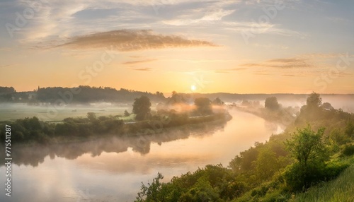 panorama of a summer landscape with sunrise fog and the river © Lauren