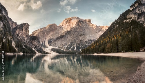 great view of the mighty rock above peaceful alpine lake braies national park fanes sennes braies italy europe photo