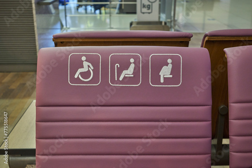 Disabled Handicap sign on a chair reserved for people with disabilities, elderly or pregnant women