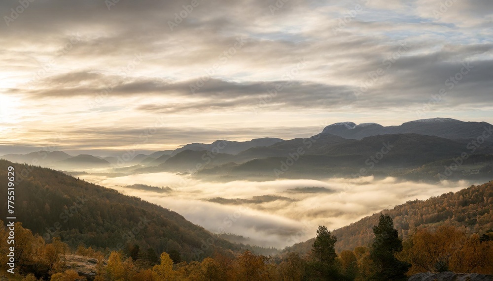 clouds and fog over the mountains in autumn