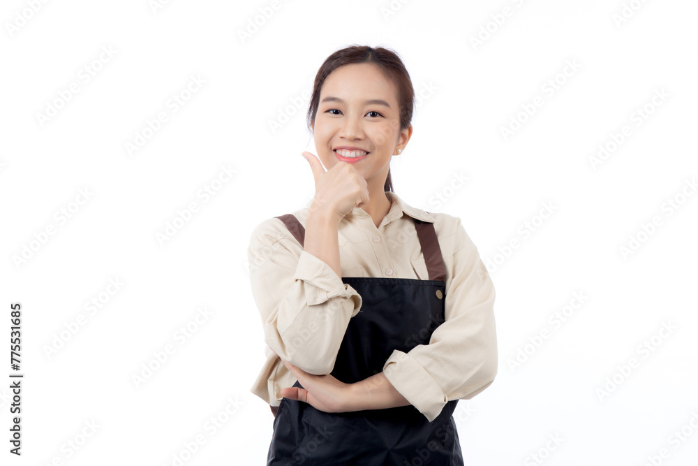 Portrait smiling young asian woman wearing apron showing thumbs up with hand isolated white background, young asian woman making thumbs up gesture, waitress or entrepreneur, small business or startup. Portrait smiling young asian woman wearing apron showing thumbs up with hand isolated white background, young asian woman making thumbs up gesture, waitress or entrepreneur, small business or startup.