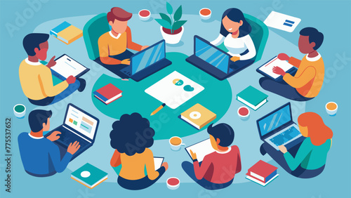 An overhead shot of a clroom with students huddled in groups around laptops collaborating and learning together through a shared online