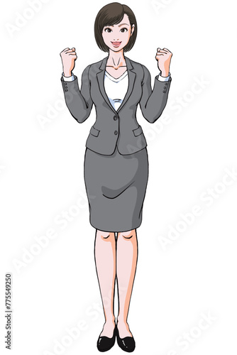 笑顔でガッツポーズ決めるスーツ姿の若い女性_正面