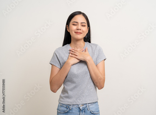 Good smell perfume. Asian woman enjoying pleasant good smell.  Calm Female taking deep breath fresh air relaxing