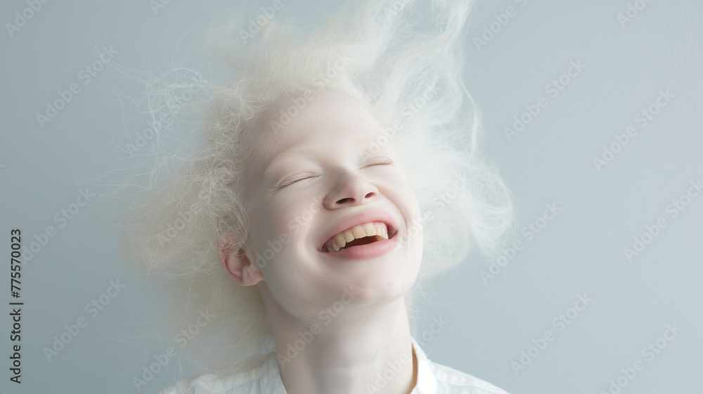 studio portrait of albino woman with blue eyes