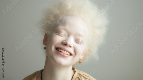 studio portrait of albino woman with blue eyes