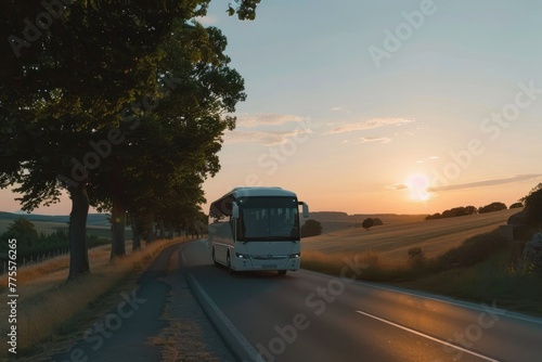 White bus driving on country road, summer transportation, country bus
