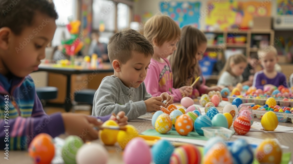 Obraz premium A toddler is sitting at a table happily painting Easter eggs, showcasing his adaptation skills and having fun in a leisure activity. His smile shows he is enjoying the recreation time AIG42E