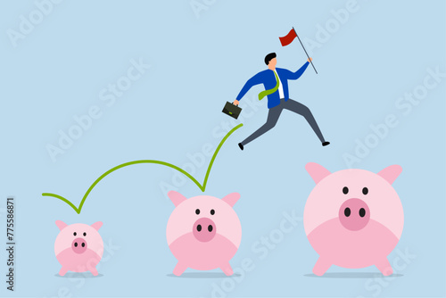 Investment and savings growth, businessman jumps from small savings bank to bigger profit to achieve financial goal.