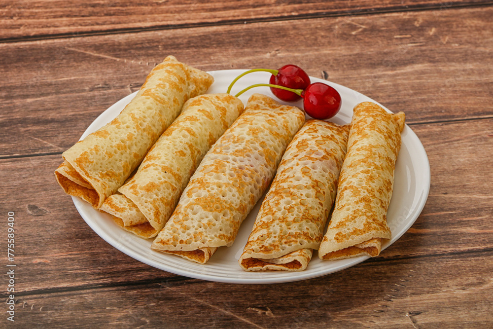 Sweet and tasty pancake with cherry Sweet and tasty pancake with cherry