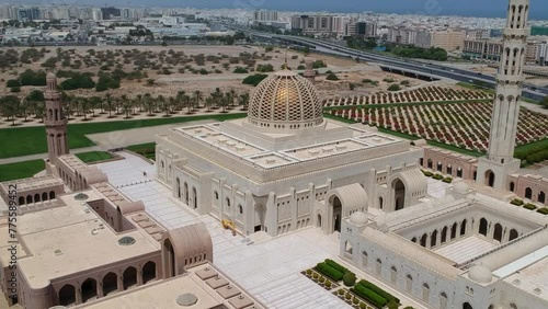 Aerial of huge Sultan Qaboos Grand Mosque with minaret and dome in Muscat, Oman. photo