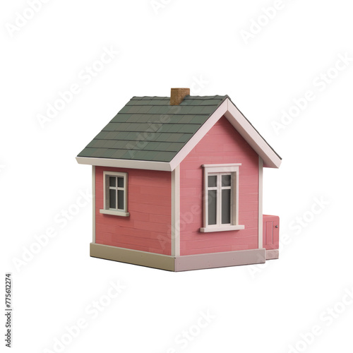 A close up of a pink house with a green roof