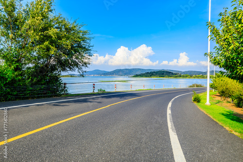 Asphalt highway road and beautiful coastline nature landscape in summer © ABCDstock