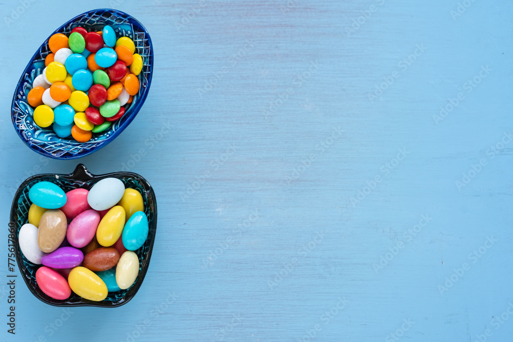 Colorful Candy and Chocolate in the Blue Background Photo, Ramadan Kareem Concept Photo, Üsküdar Istanbul, Turkiye (Turkey) Colorful Candy and Chocolate in the Blue Background Photo, Ramadan Kareem Concept Photo, Üsküdar Istanbul, Turkiye (Turkey)