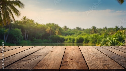 empty wooden table with blurred summer background