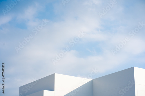 architecture and landscape concept with white building with cloudy sky background