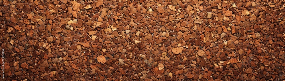 Full frame of brown corkboard texture for versatile background use
