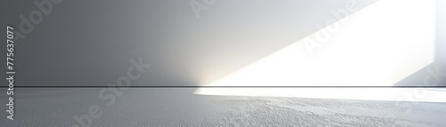 Minimalist white wall with textured plaster and sharp light shadow 