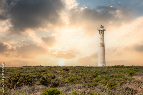 Morro Jable lighthouse on the island of Fuerteventura in the Canary Islands at sunset