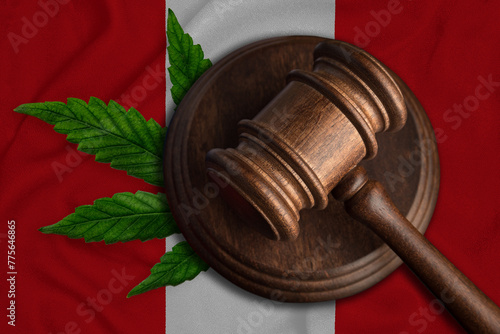 Marijuana law concept with a wooden gavel on the Peru flag background.