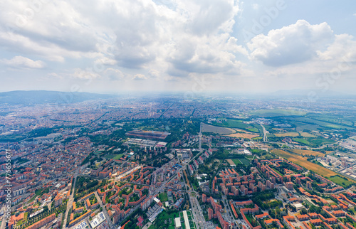 Turin, Italy. Panorama of the city in summer. Industrial and residential areas. Fields. Aerial view