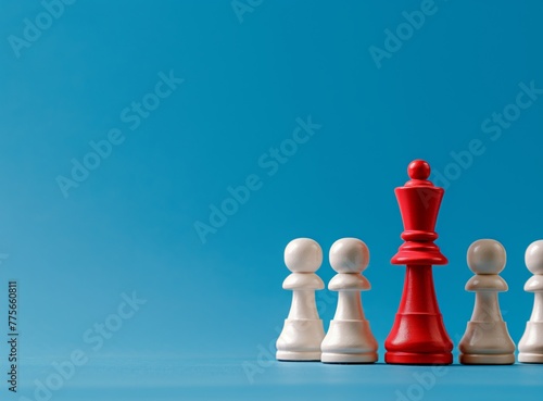Obraz na płótnie Red chess queen among white pawns on blue copy space w salonie