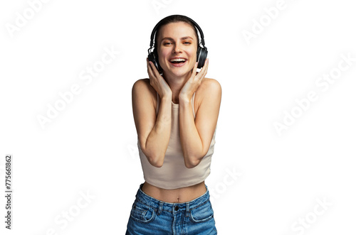 Young cheerful woman enjoying music with headphone, wearing casual top, PNG, isolated on grey studio background