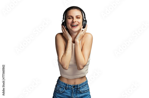 Young cheerful woman enjoying music with headphone, wearing casual top, PNG,  isolated on grey studio background